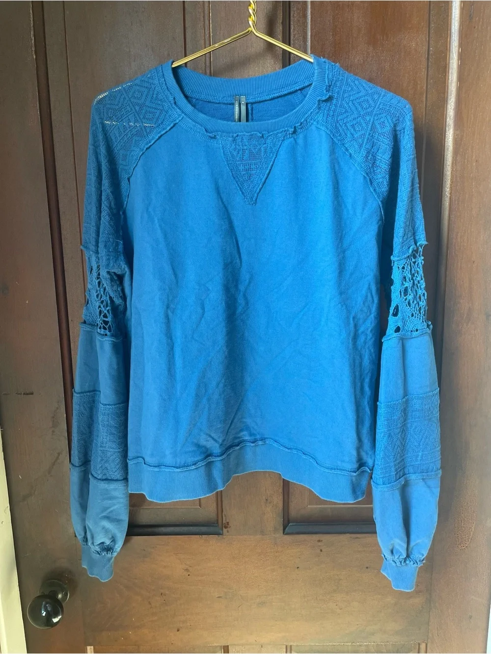 Anthropologie women's medium long sleeve blue top